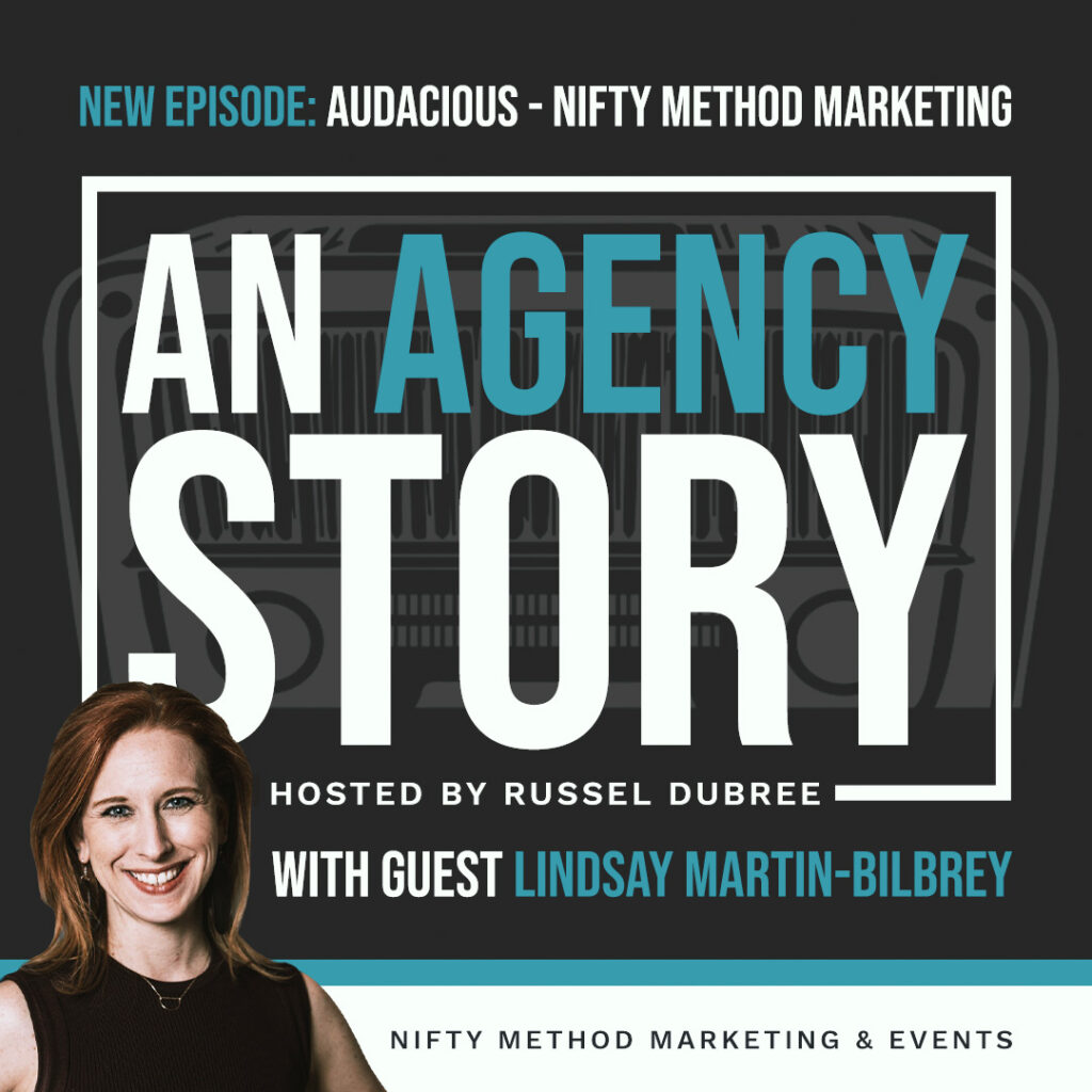 Episode graphic for "An Agency Story" podcast with Lindsay Martin-Bilbrey - title Audacious - Hosted by Russel Dubree - picture of Lindsay smiling in the lower right corner with brown hair and a black sleeveless blouse.